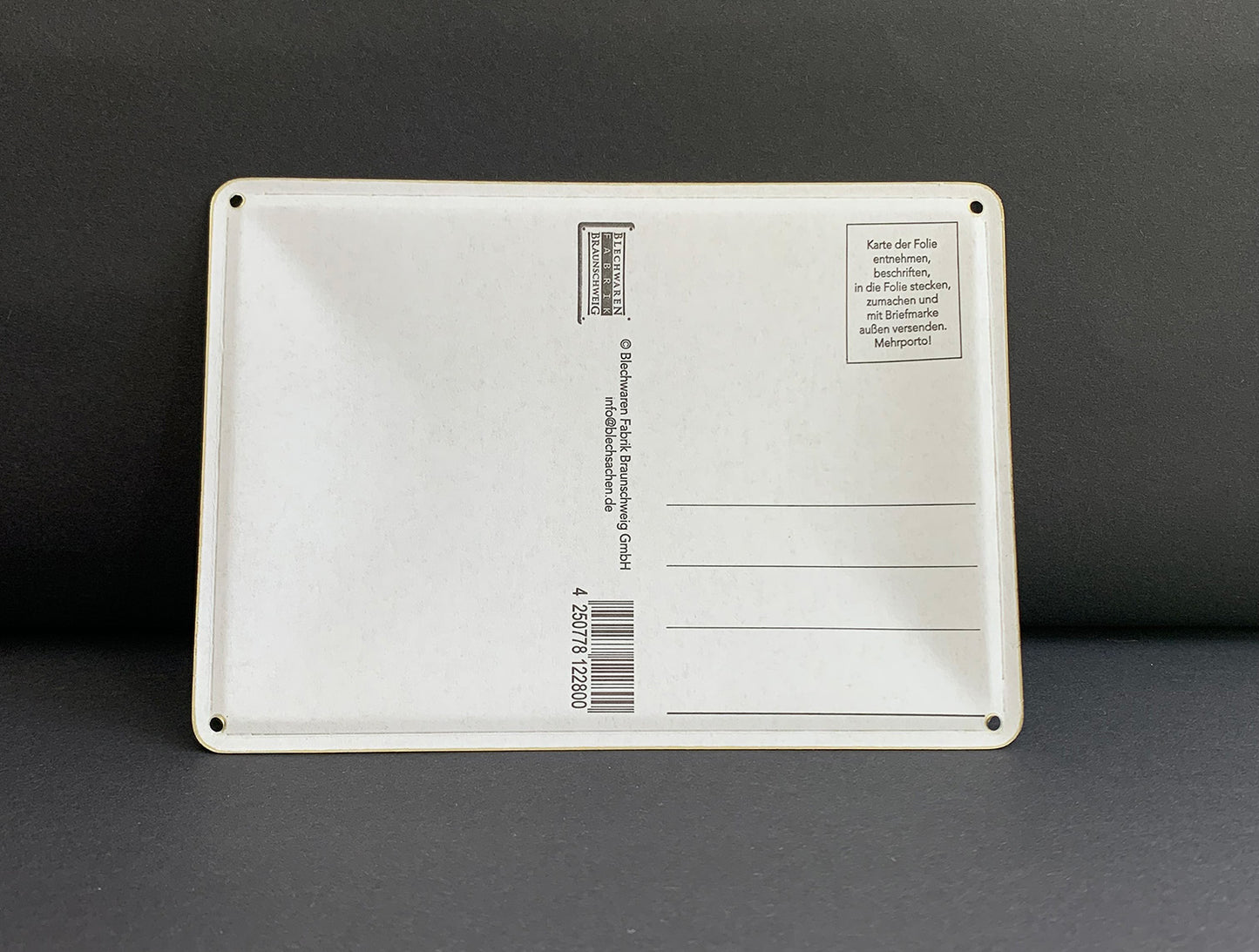 Rückseite von dem Blechschild mit dem text "Hier war Luther nie"