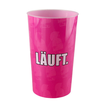 Pinker Mehrwegbecher mit dem Text "Läuft"